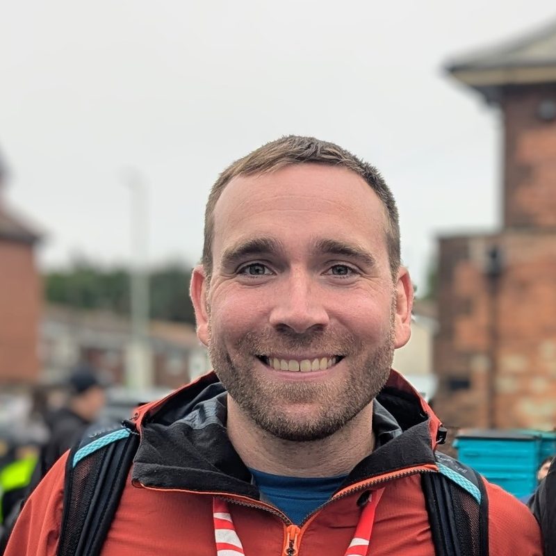 Andrew smiling after a half marathon